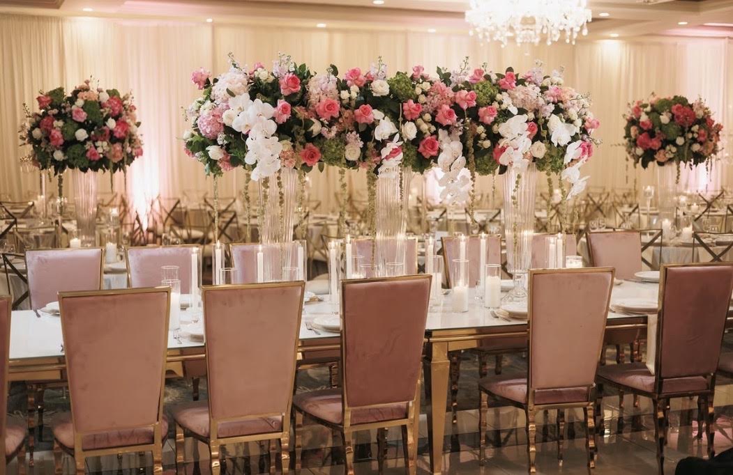Blush and gold tablescape with elevated florals