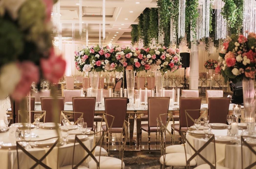 Grand reception hall with pink velvet chairs